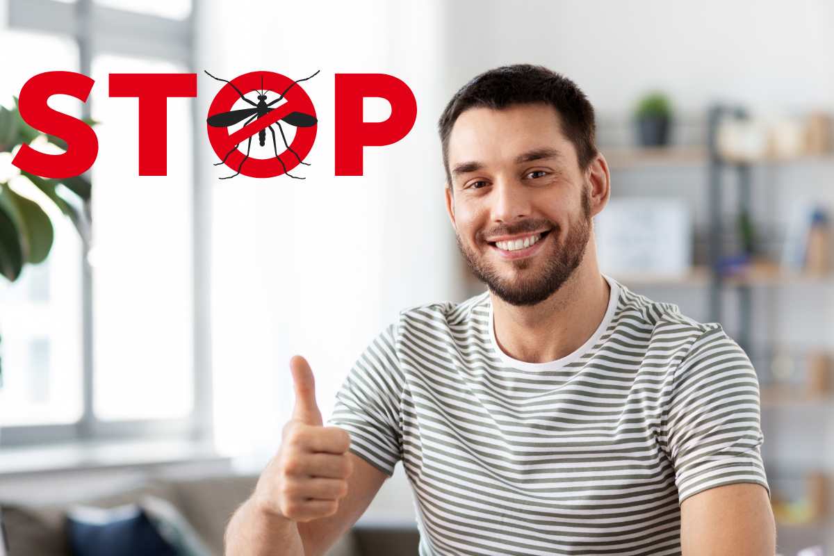 ragazzo sorridente che fa il segno ok con il pollice e scritta stop